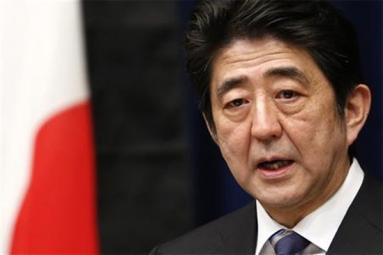 Japan's Shinzo Abe heads for New York for first talks with Trump